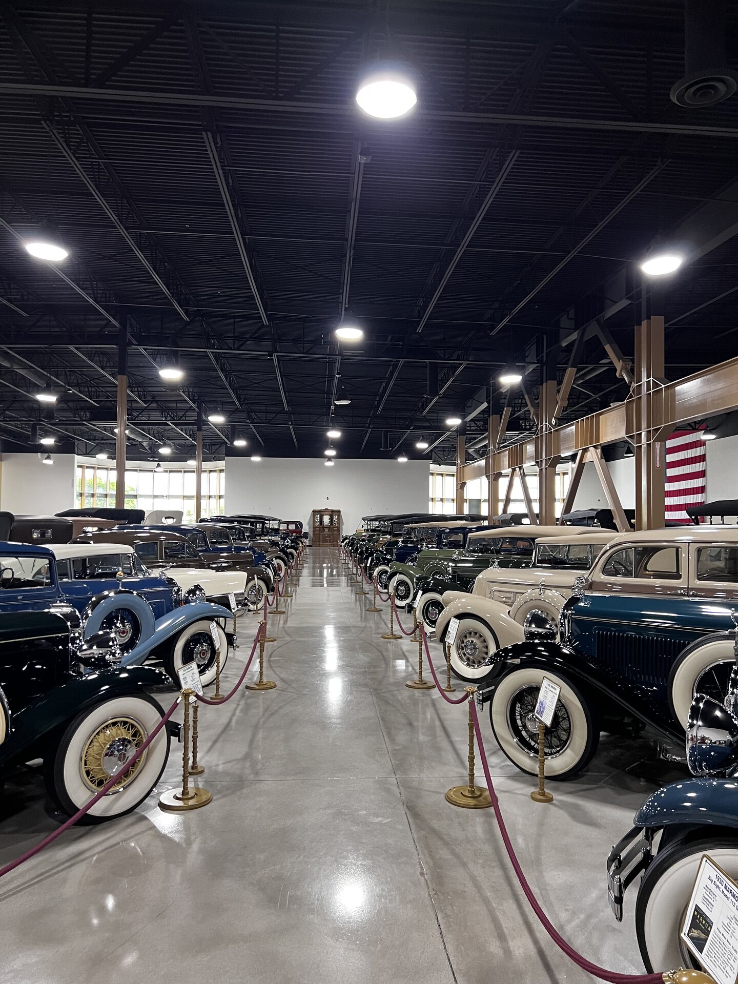 A room of significant automobiles photographed first-hand by Omar Mukhtar.